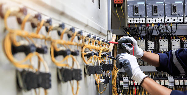 Professional Electrician technician working in Hollis, OK